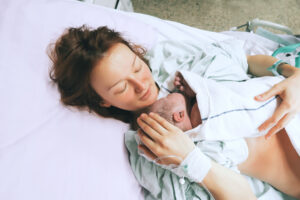 entonox nitrous oxide analysis woman in bed with baby