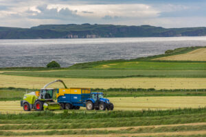 third-cut silage tractor in field